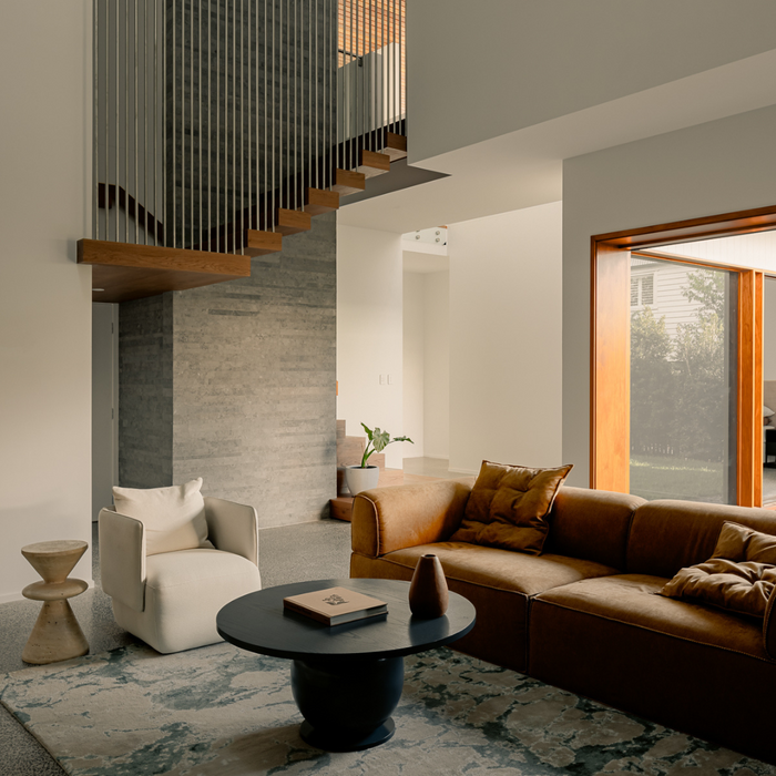 Desert Calm Sofa - Manissa Caramel, styled in a double-height living room