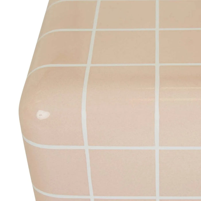 Close-up of the rounded top edge of the Andalusian Mosaic Side Table in pink glaze