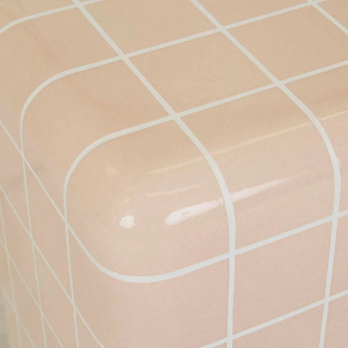 Close-up of a rounded corner of the Andalusian Mosaic Side Table in pink glaze