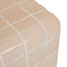Close-up of the rounded side edge of the Andalusian Mosaic Side Table in pink glaze