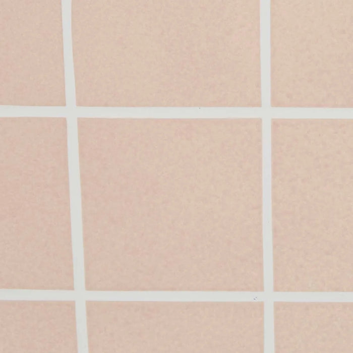 Pink glaze tile surface with white grout lines, from the Andalusian Mosaic Side Table