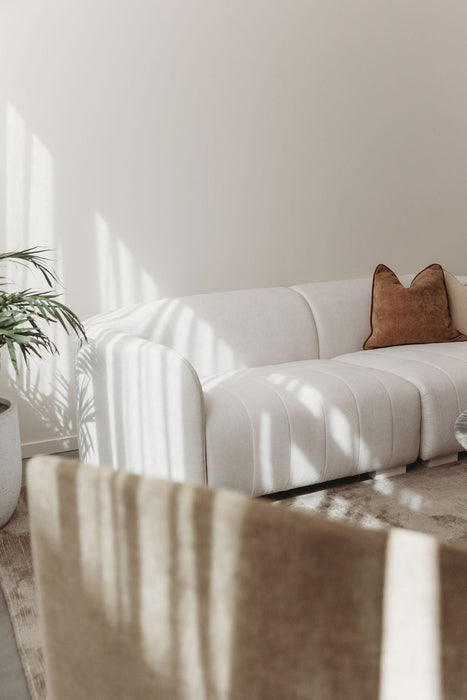 Juniper Pearl Sofa - Kindred Snow, styled in a sunlit living room