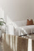 Juniper Pearl Sofa - Kindred Snow, styled in a sunlit living room