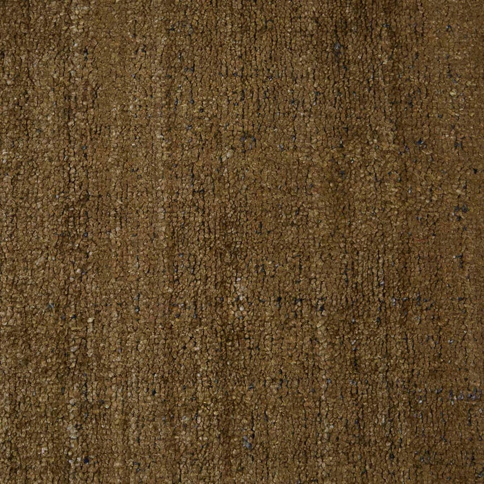Tepih Dune Rug in Olive, close-up of the pile and its tonal streaks