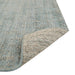 Tepih Dune Rug in Sacramento, a corner folded back to show the underside