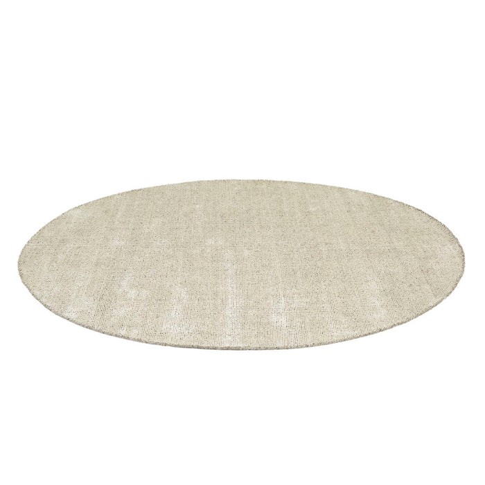 Tepih Dune Round Rug in Oatmeal, the whole round rug shown flat on a plain background