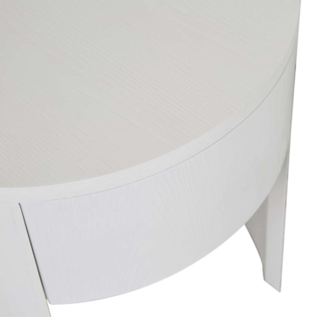 Close-up of the curved edge and drawer line of the Oberon Crescent Bedside in white grain ash