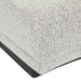 Felix Orbit Wedge Ottoman - Ore Speckle / Matt Black Ash