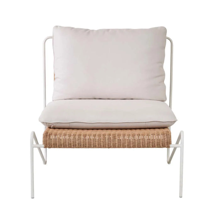 Blossom Armchair with a bone frame, woven honey seat and cream cushions, front view