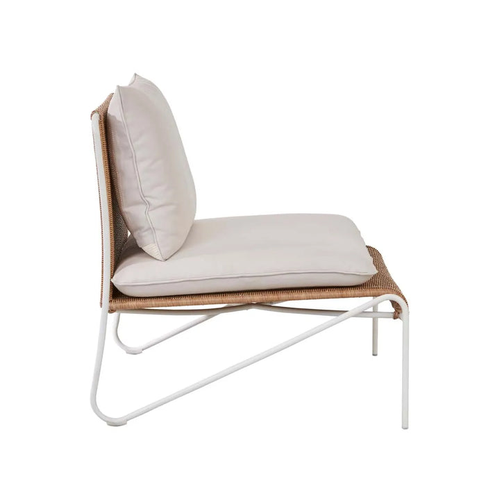 Blossom Armchair, side view showing the bone frame and woven honey seat