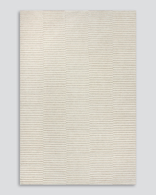 Anni Floor Rug in Oat, the whole rug shown flat on a plain background