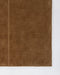 Bastion Floor Rug in Hazelnut, close-up of a corner showing the edge and wool pile