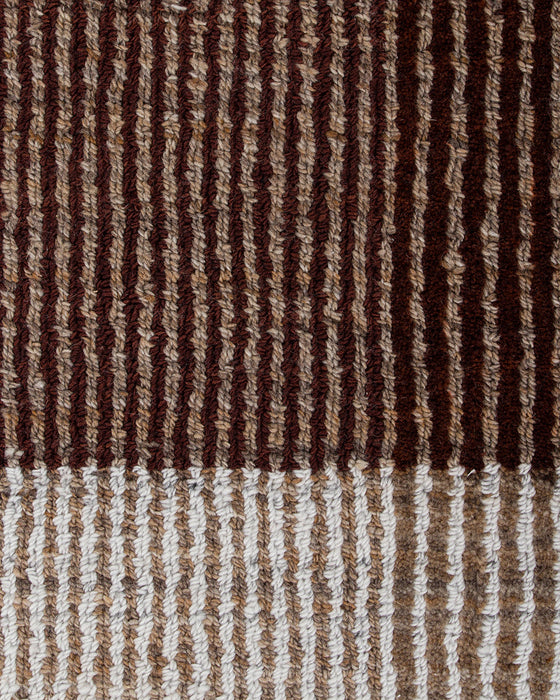 Bedrock Floor Rug in Claret, close-up of the recycled PET pile and texture
