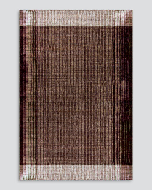 Bedrock Floor Rug in Claret, the whole rug shown flat on a plain background