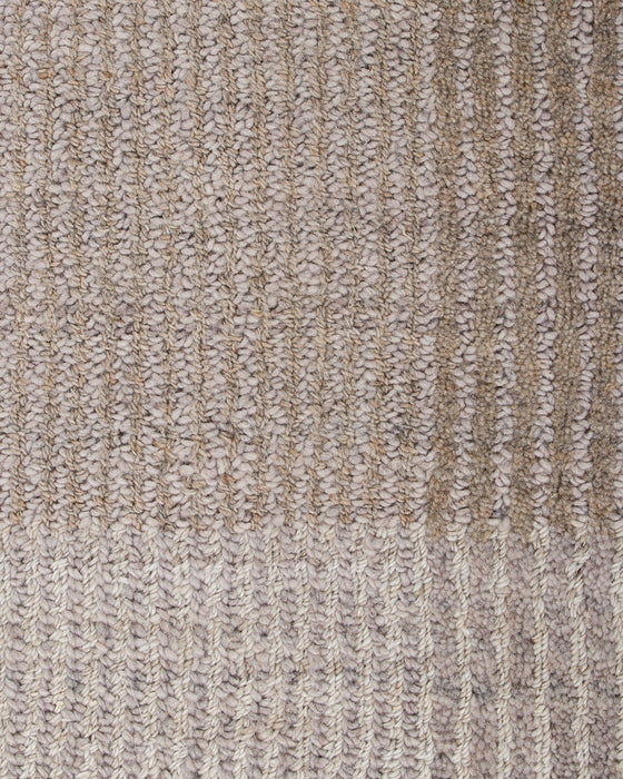 Bedrock Floor Rug in Sand, close-up of the recycled PET pile and texture