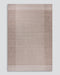 Bedrock Floor Rug in Sand, the whole rug shown flat on a plain background