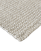 Kansas Floor Rug in Oat/Natural, close-up of a corner showing the edge and wool and viscose pile