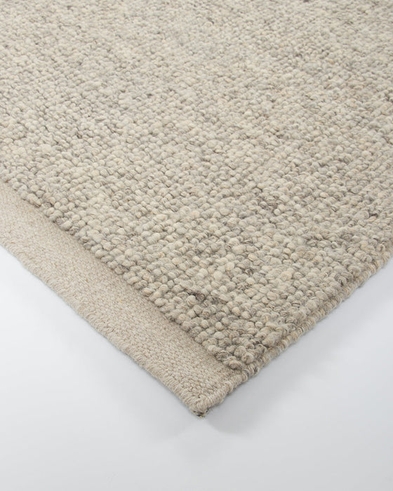 Clifton Floor Rug in Ash, close-up of a corner showing the edge and wool pile