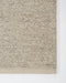 Clifton Floor Rug in Ash, close-up of a corner showing the edge and wool pile