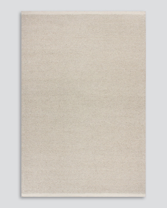 Clifton Floor Rug in Bone, the whole rug shown flat on a plain background
