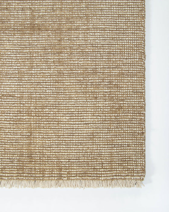 Corbett Floor Rug in Honey, close-up of a corner showing the edge and wool pile