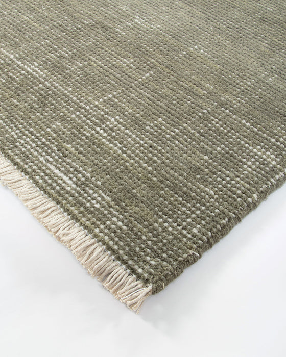 Corbett Floor Rug in Lichen, close-up of a corner showing the edge and wool pile