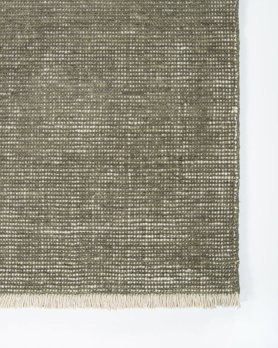 Corbett Floor Rug in Lichen, close-up of a corner showing the edge and wool pile