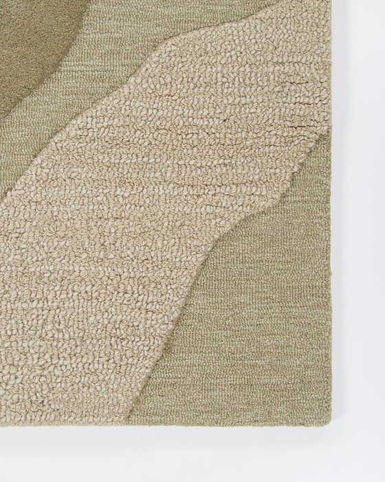 Edgewater Floor Rug in Pistachio, close-up of a corner showing the edge and wool pile
