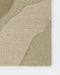 Edgewater Floor Rug in Pistachio, close-up of a corner showing the edge and wool pile