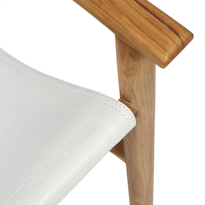 Close-up of the timber arm and white leather sling of the Felix Leather Chair