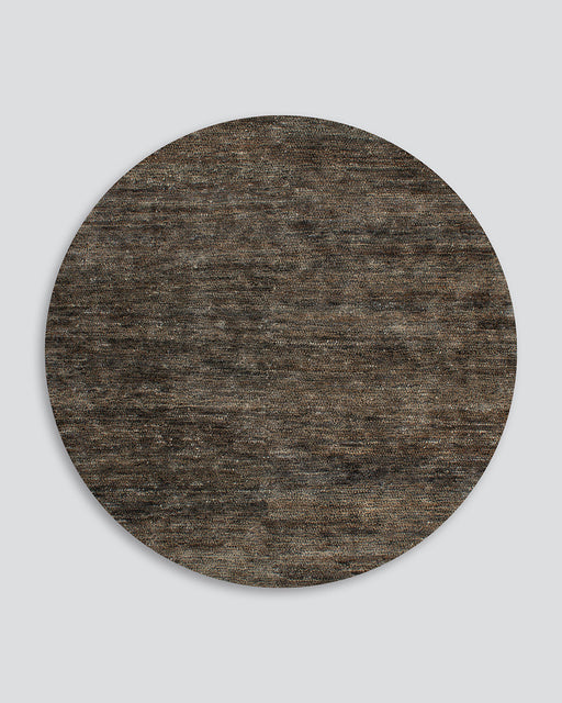 Fairbanks Round Floor Rug in Fossil, the whole round rug shown flat on a plain background