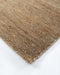 Fairbanks Floor Rug in Sand, close-up of a corner showing the edge and viscose and jute pile