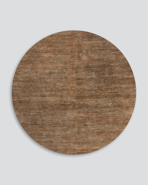 Fairbanks Round Floor Rug in Sand, the whole round rug shown flat on a plain background