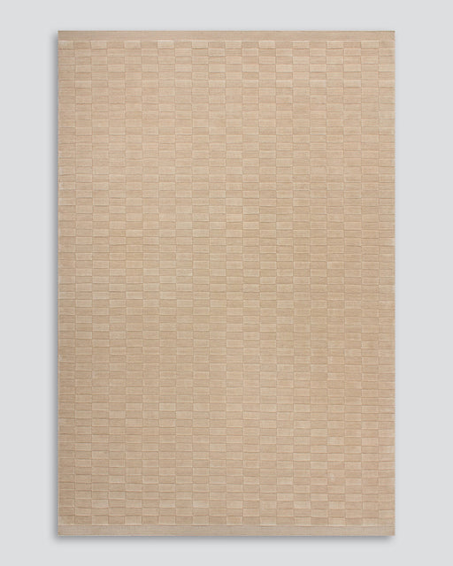 Hugo Floor Rug in Almond, the whole rug shown flat on a plain background