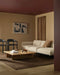 Hugo Floor Rug in Espresso, in a living room with a cream sofa, timber coffee table and black dining chairs