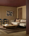 Hugo Floor Rug in Espresso, in a living room with a cream sofa, striped cushions and timber coffee table