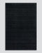 Hugo Floor Rug in Midnight, the whole rug shown flat on a plain background