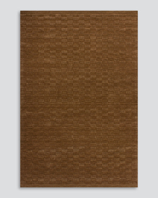 Hugo Floor Rug in Toffee, the whole rug shown flat on a plain background