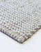 Kansas Floor Rug in Oyster/Natural, close-up of a corner showing the edge and wool and viscose pile
