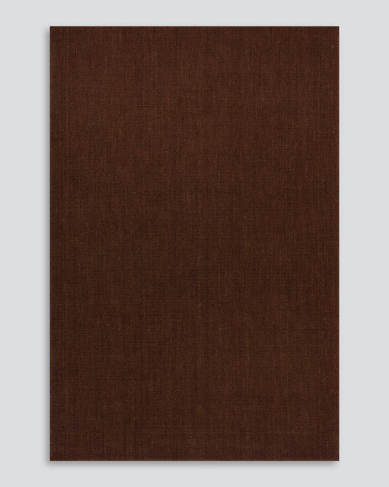 Linden Floor Rug in Brick, the whole rug shown flat on a plain background