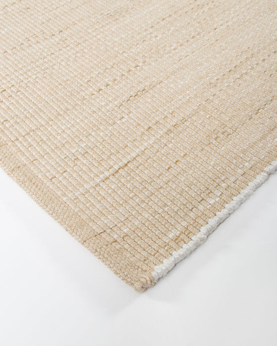 Lonsdale Floor Rug in Almond, close-up of a corner showing the edge and recycled PET pile