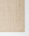 Lonsdale Floor Rug in Almond, close-up of a corner showing the edge and recycled PET pile