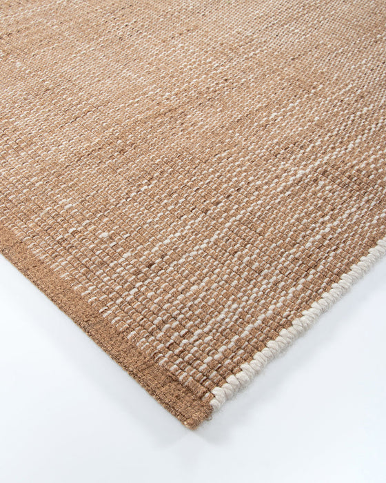 Lonsdale Floor Rug in Cumin, close-up of a corner showing the edge and recycled PET pile