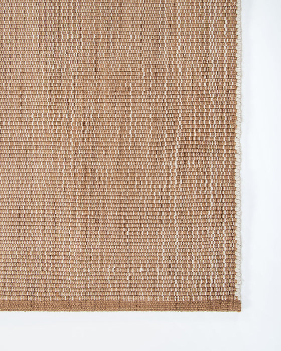 Lonsdale Floor Rug in Cumin, close-up of a corner showing the edge and recycled PET pile