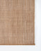 Lonsdale Floor Rug in Cumin, close-up of a corner showing the edge and recycled PET pile