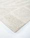 Maya Floor Rug in Oatmeal, close-up of a corner showing the edge and wool pile