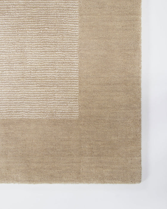 Mayfair Floor Rug in Abalone, close-up of a corner showing the edge and linen and wool pile