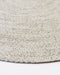 Mornington Round Floor Rug in Pale Sand, close-up of the curved edge and recycled PET weave