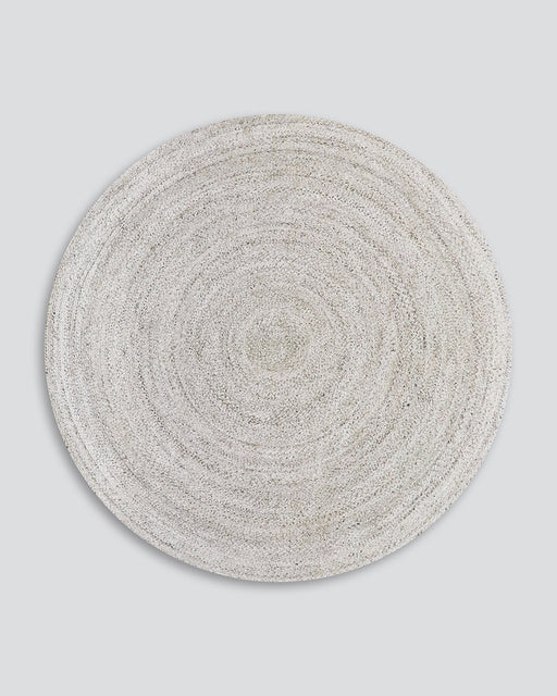 Mornington Round Floor Rug in Pale Sand, the whole round rug shown flat on a plain background