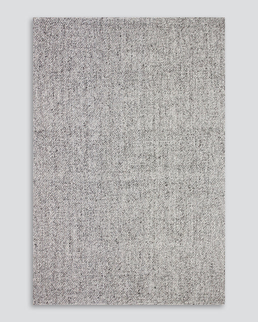 Nebraska Floor Rug in Ash, the whole rug shown flat on a plain background